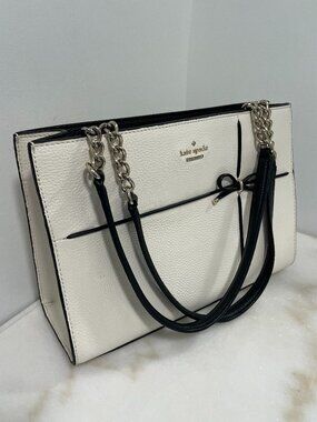 Kate Spade Cherry Street Phoebe pebbled leather cream with black bow detail